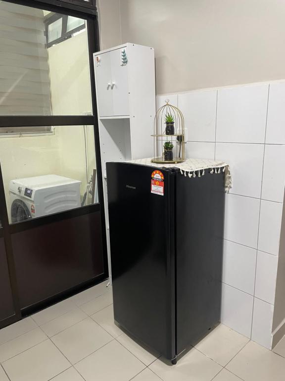 Kuchyň nebo kuchyňský kout v ubytování Omma Homestay Putrajaya, Presint 17