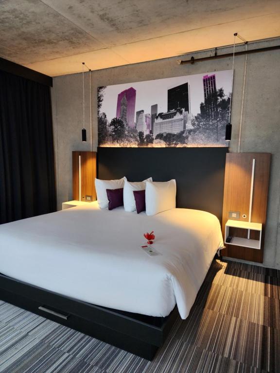 Postel nebo postele na pokoji v ubytování Grand Hotel Times Levis
