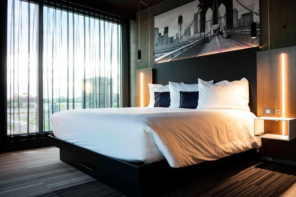 Postel nebo postele na pokoji v ubytování Grand Hotel Times Levis