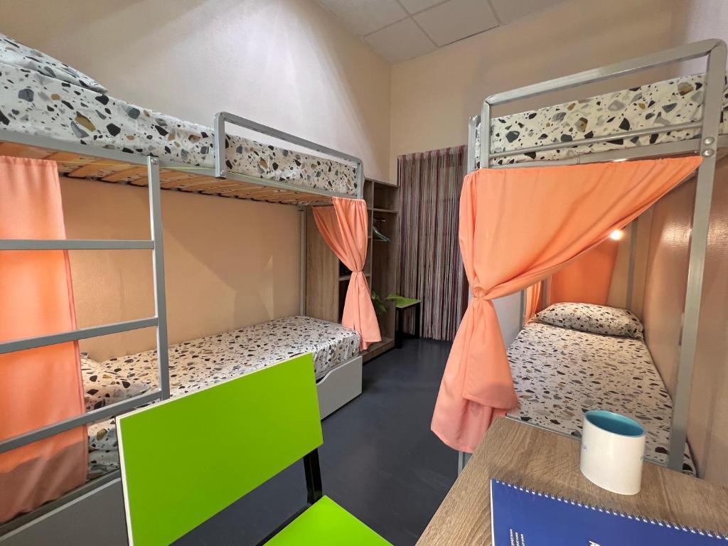 Postelja oz. postelje v sobi nastanitve Amely Hostel