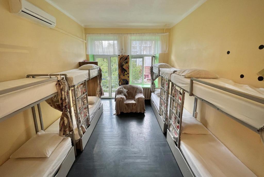 Postelja oz. postelje v sobi nastanitve Amely Hostel