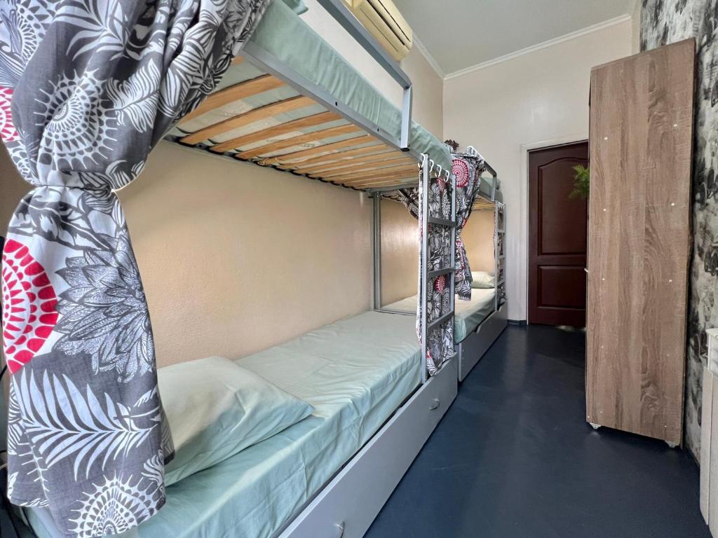 Postelja oz. postelje v sobi nastanitve Amely Hostel