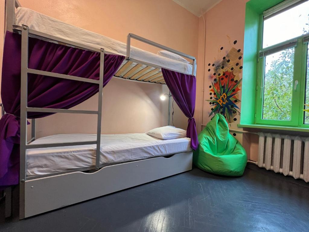 Postelja oz. postelje v sobi nastanitve Amely Hostel