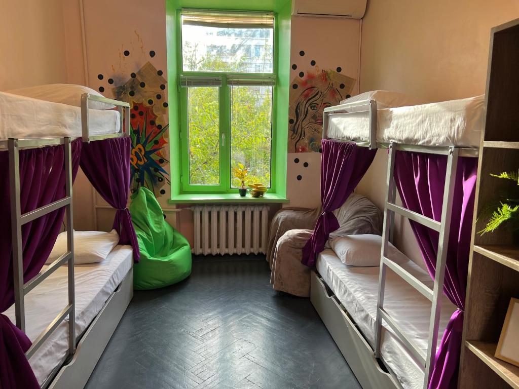 Postelja oz. postelje v sobi nastanitve Amely Hostel