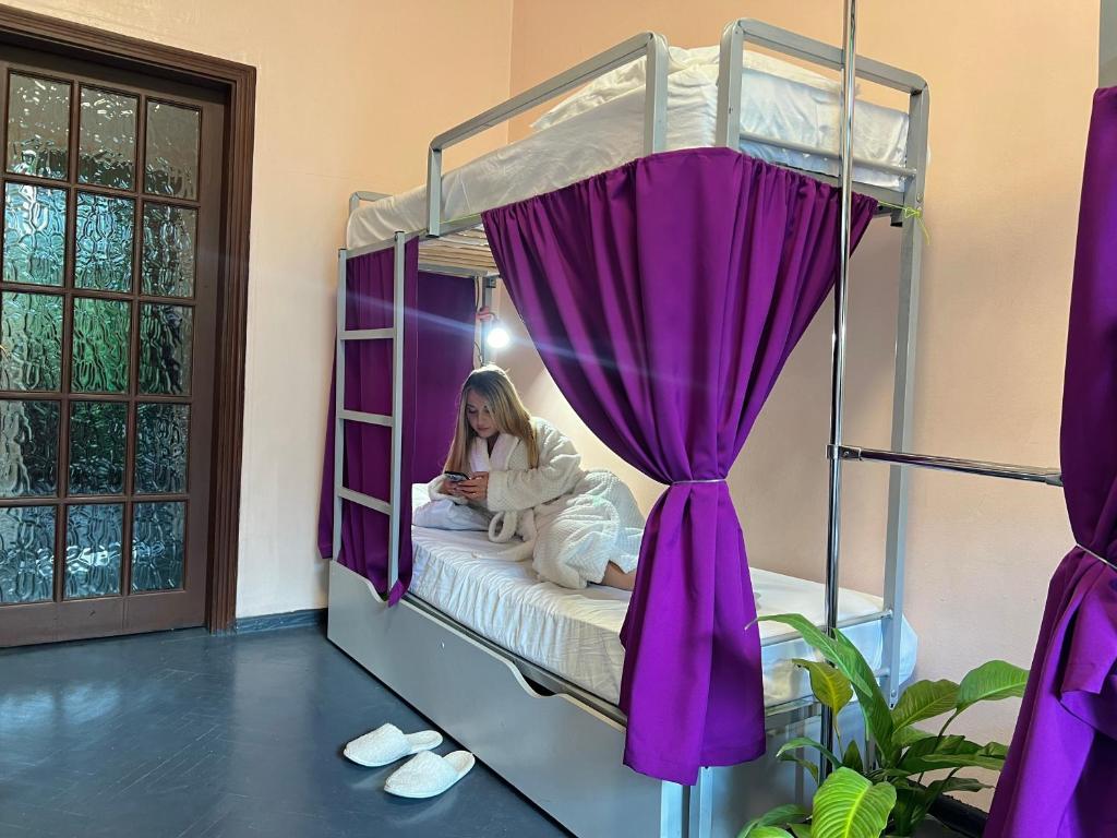 Postelja oz. postelje v sobi nastanitve Amely Hostel