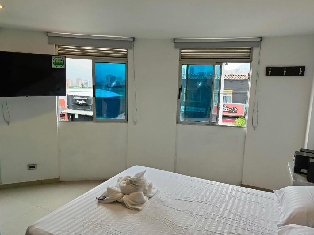 Postel nebo postele na pokoji v ubytování Hotel Buenos Aires Central