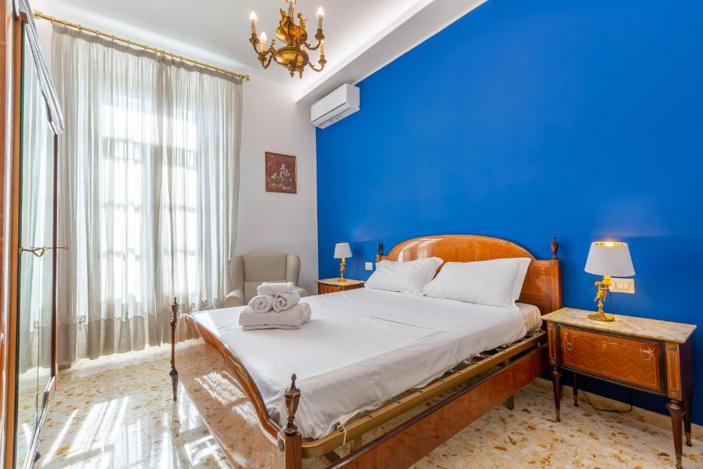 A bed or beds in a room at Aqua Claudia and Anio Novus Apartments