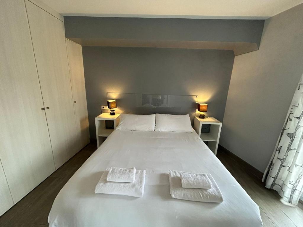 Posteľ alebo postele v izbe v ubytovaní IV Apartamento junto a PLAZA MAYOR