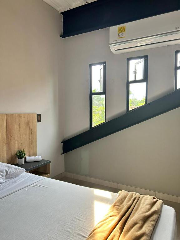 Postel nebo postele na pokoji v ubytování Seven hotel