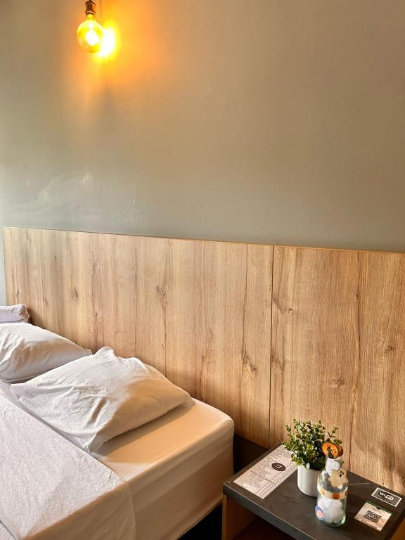 Postel nebo postele na pokoji v ubytování Seven hotel