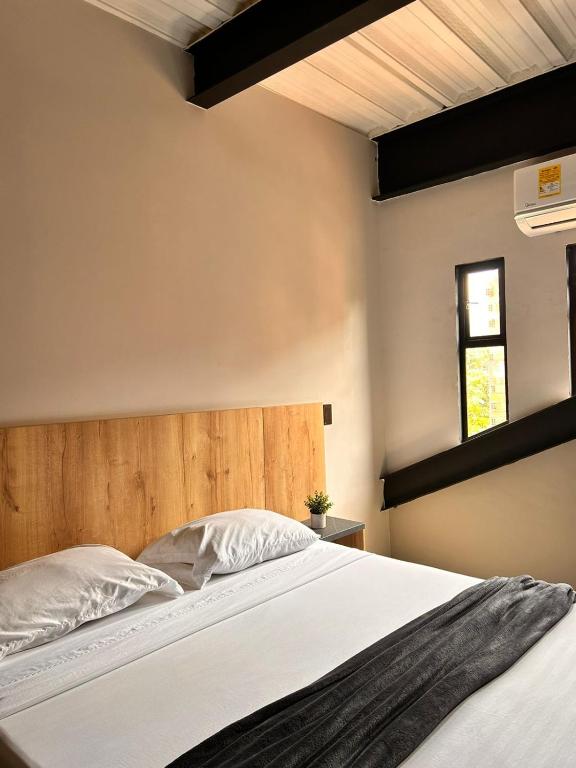 Postel nebo postele na pokoji v ubytování Seven hotel