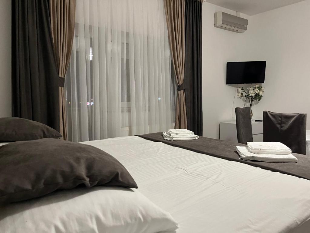 Ліжко або ліжка в номері Rooms Elez