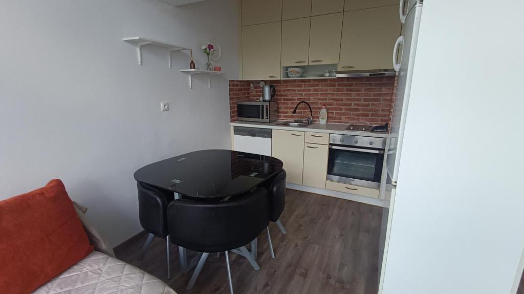 Η κουζίνα ή μικρή κουζίνα στο 2 room Apartment, 413