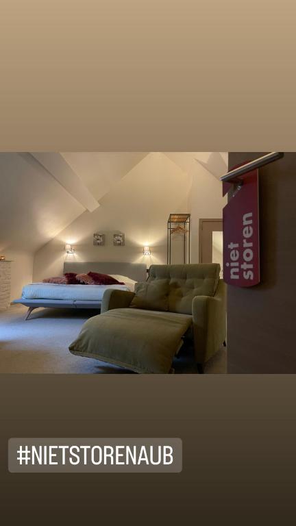 Postel nebo postele na pokoji v ubytování De Verborgen Parel B&B