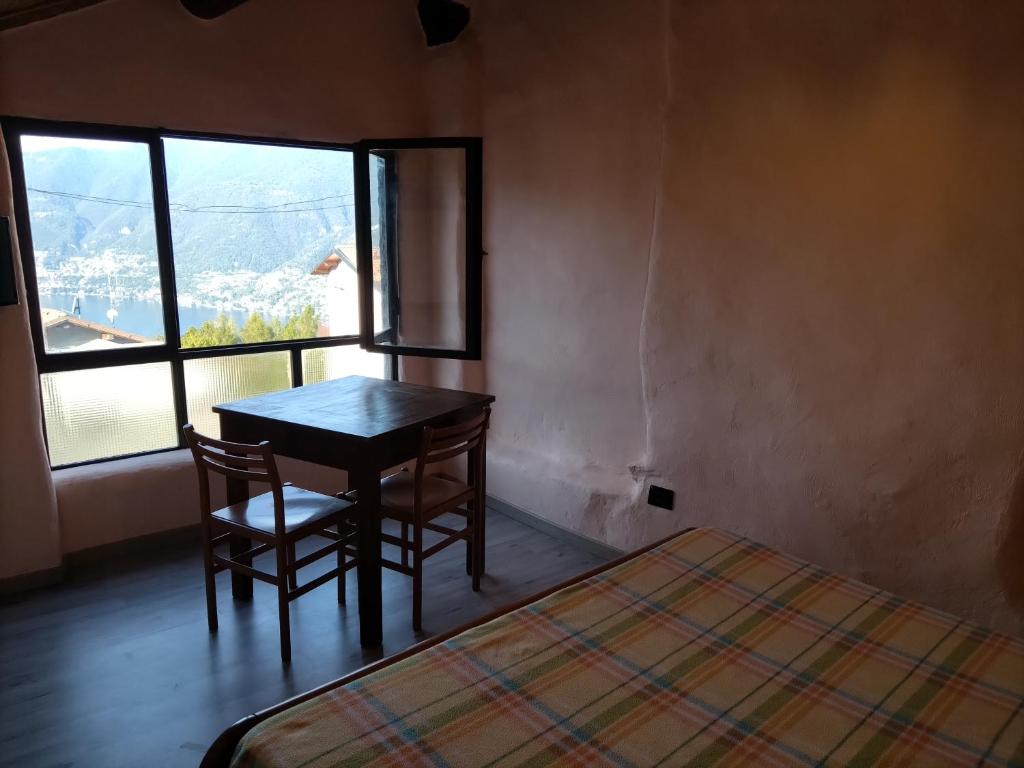 Postel nebo postele na pokoji v ubytování casa tarcisio