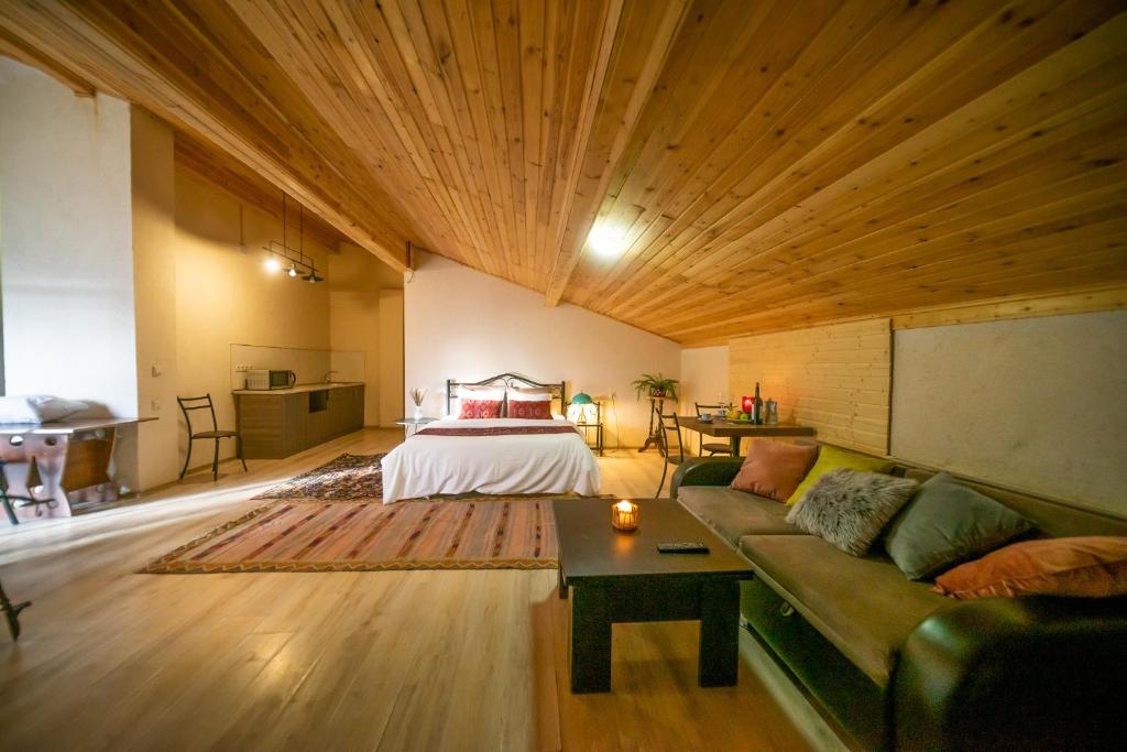Кровать или кровати в номере Chalet Papa Basili