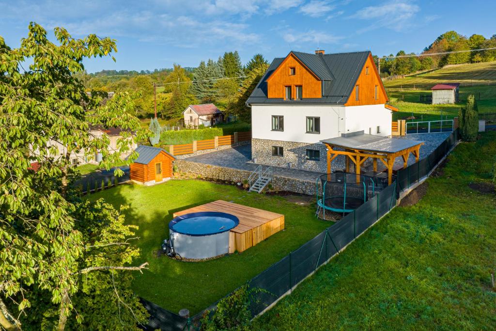 an aerial view of a house with a backyard at Wellness Chata Panorama in Dolní Podluží