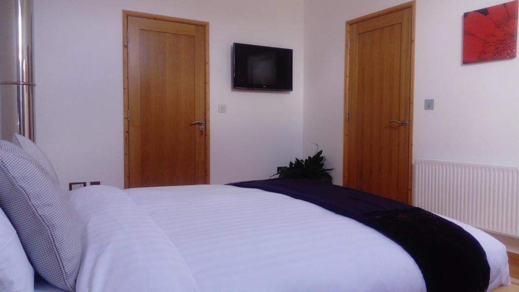 Postel nebo postele na pokoji v ubytování Augherea House