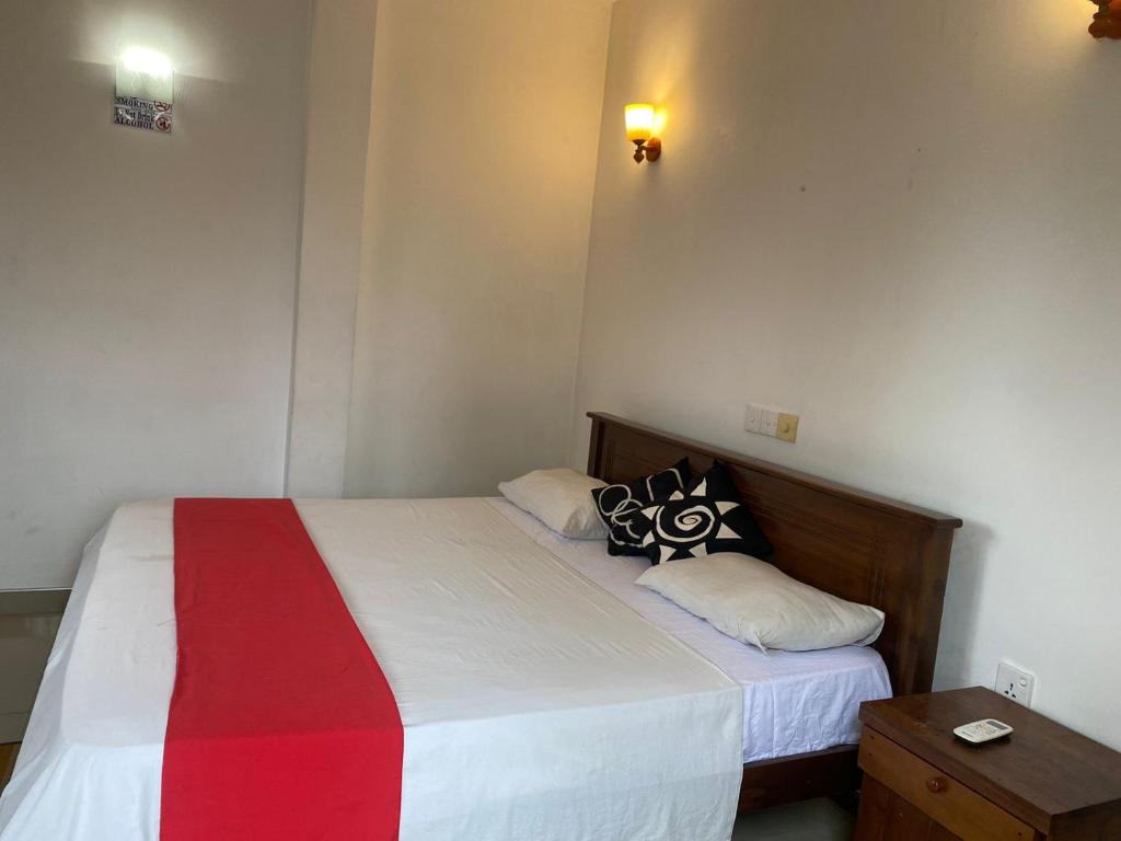 Postel nebo postele na pokoji v ubytování JJ VILLA ALUTHGAMA
