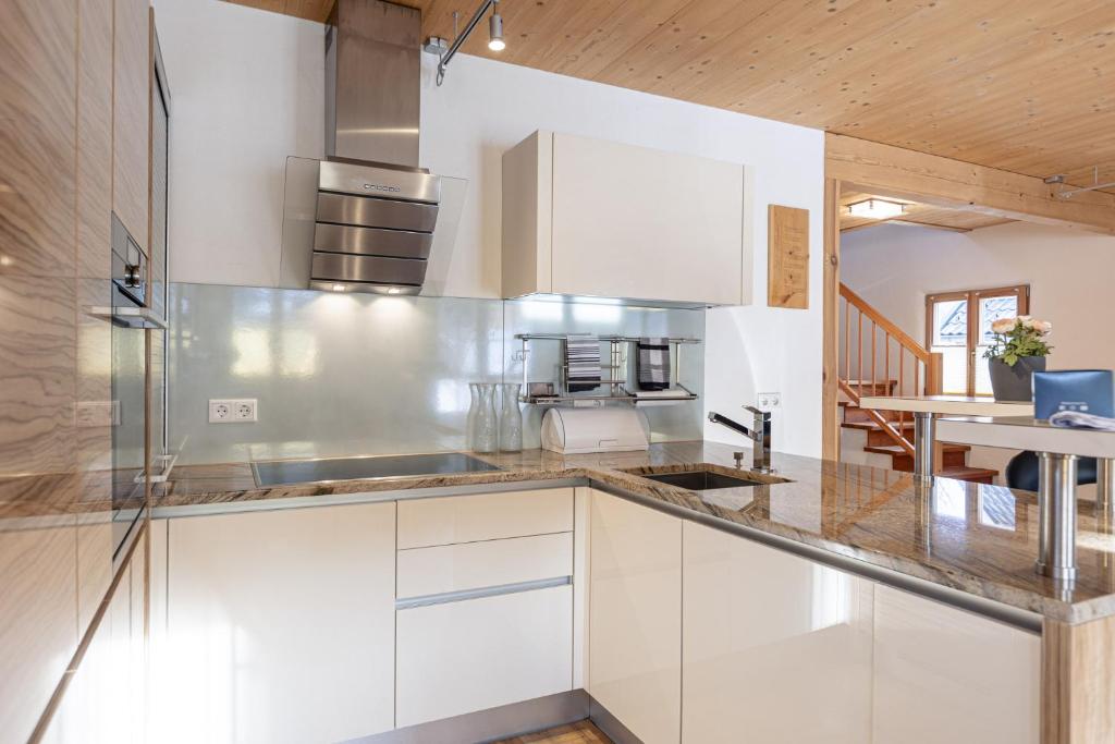 Kuchyň nebo kuchyňský kout v ubytování Chalet Fanningberg