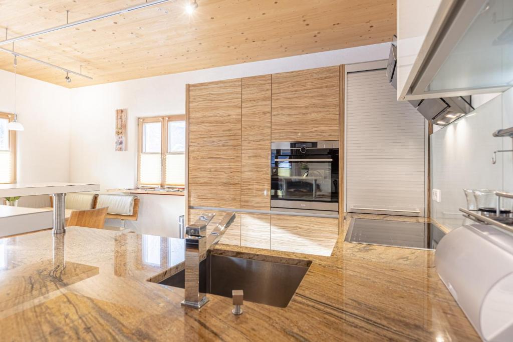 Kuchyň nebo kuchyňský kout v ubytování Chalet Fanningberg
