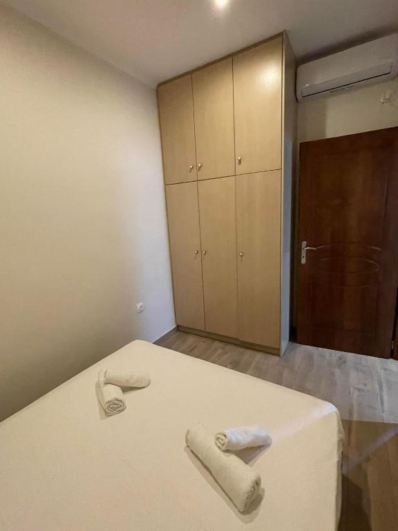 Postel nebo postele na pokoji v ubytování kalos house