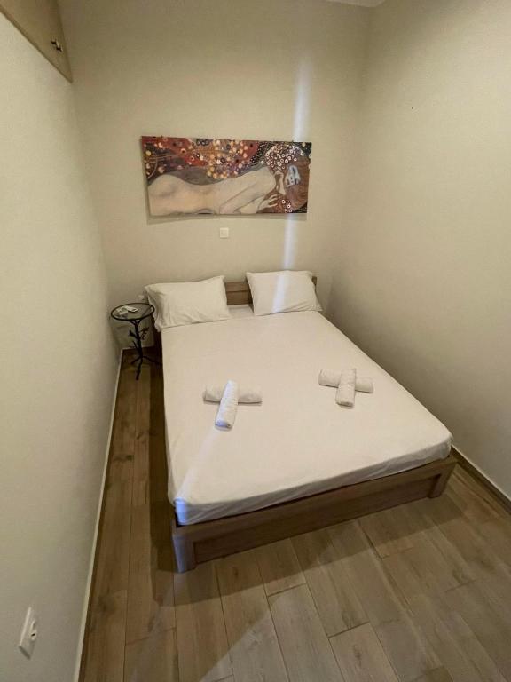 Postel nebo postele na pokoji v ubytování kalos house