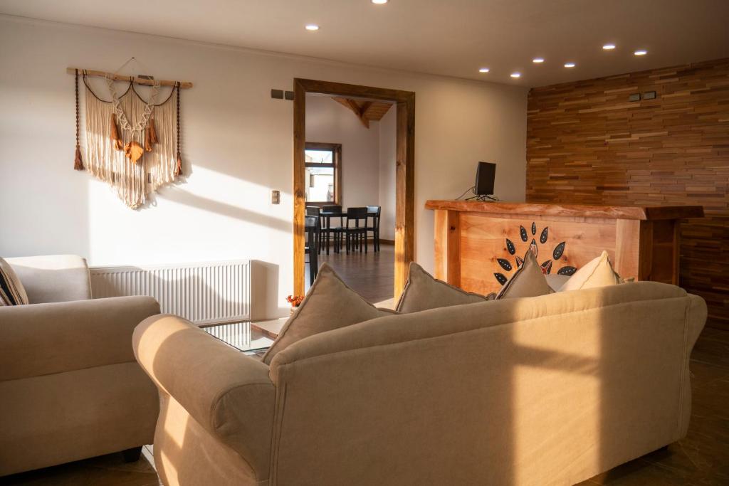 Posezení v ubytování Hotel y Cabañas Pulegan