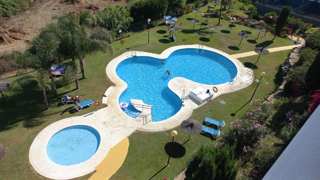Bazén v ubytovaní Ideal Apartamento Manilva Playa alebo v jeho blízkosti