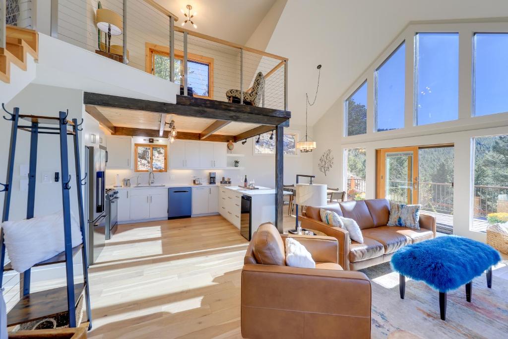 a large kitchen and living room with a loft at Luxury Haven with Hot Tub and Staunton State Park View in Conifer