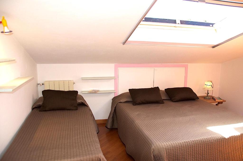 Кровать или кровати в номере Hotel Anna