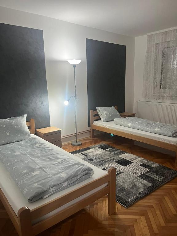 Postel nebo postele na pokoji v ubytování Lana