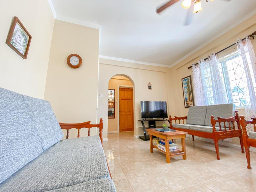 TV a/nebo společenská místnost v ubytování Paradise Villa
