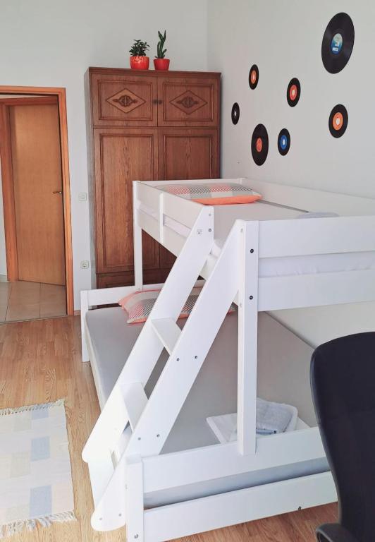 Posteľ alebo postele v izbe v ubytovaní Kuća za odmor Leptirić