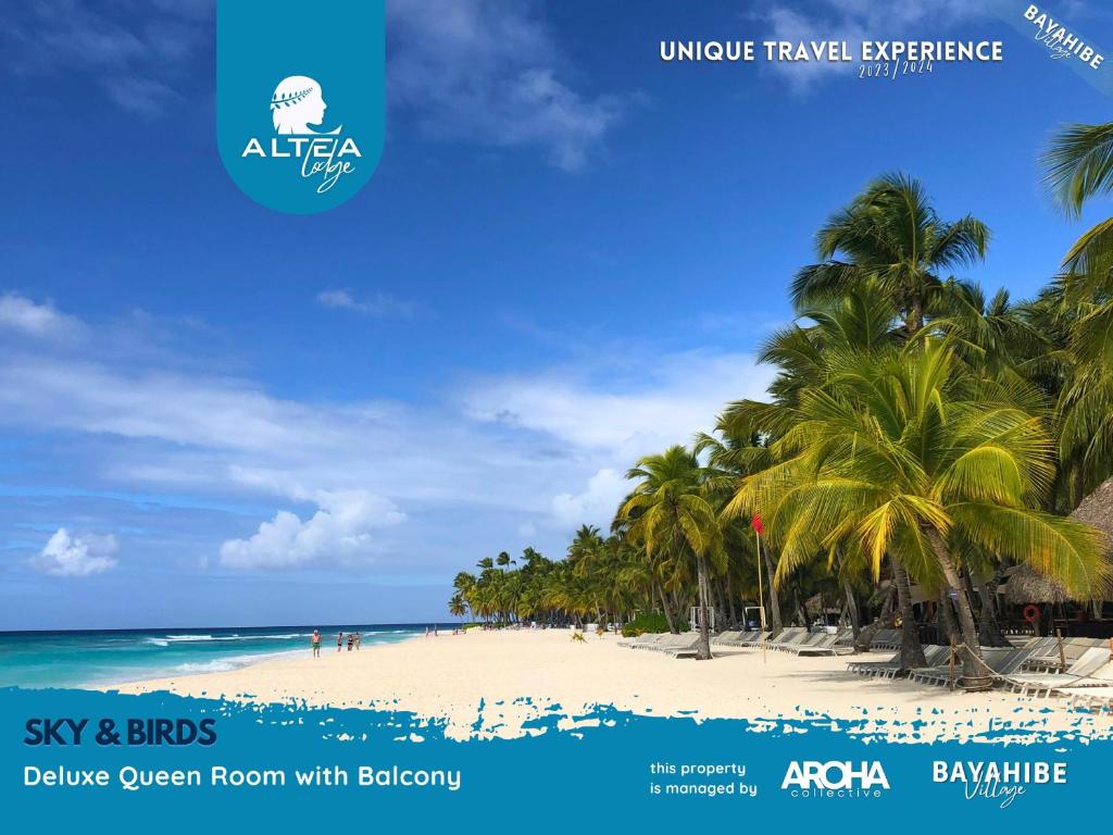 a beach with palm trees and the ocean at Bayahibe Lodge in Bayahibe