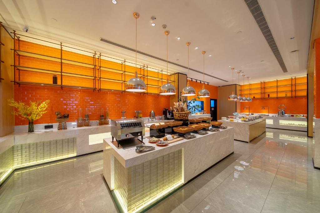 Fotografie z fotogalerie ubytování Guangzhou Baiyun Airport COCO Hotel v destinaci Huadu
