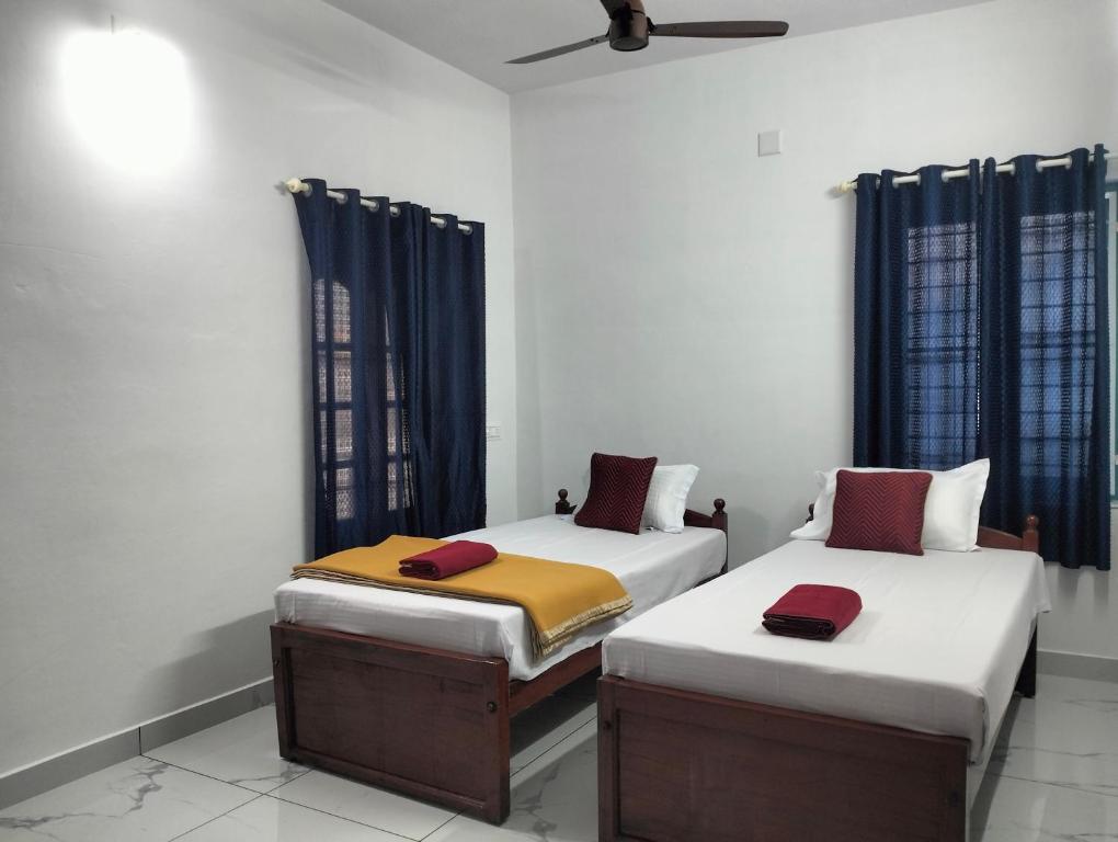 Letto o letti in una camera di Guestland Homestay