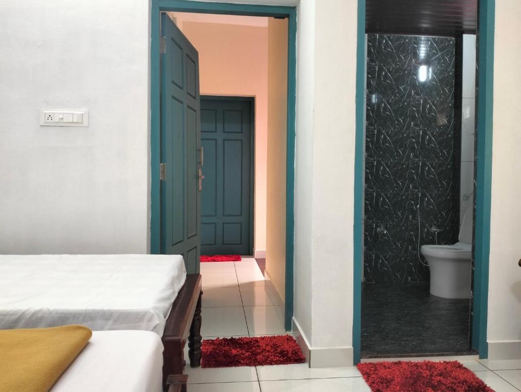 Letto o letti in una camera di Guestland Homestay