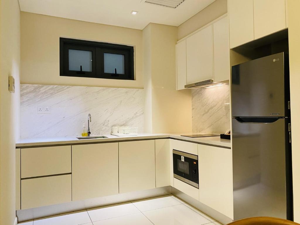 Kuchyň nebo kuchyňský kout v ubytování Tribeca Serviced Hotel by Millennium