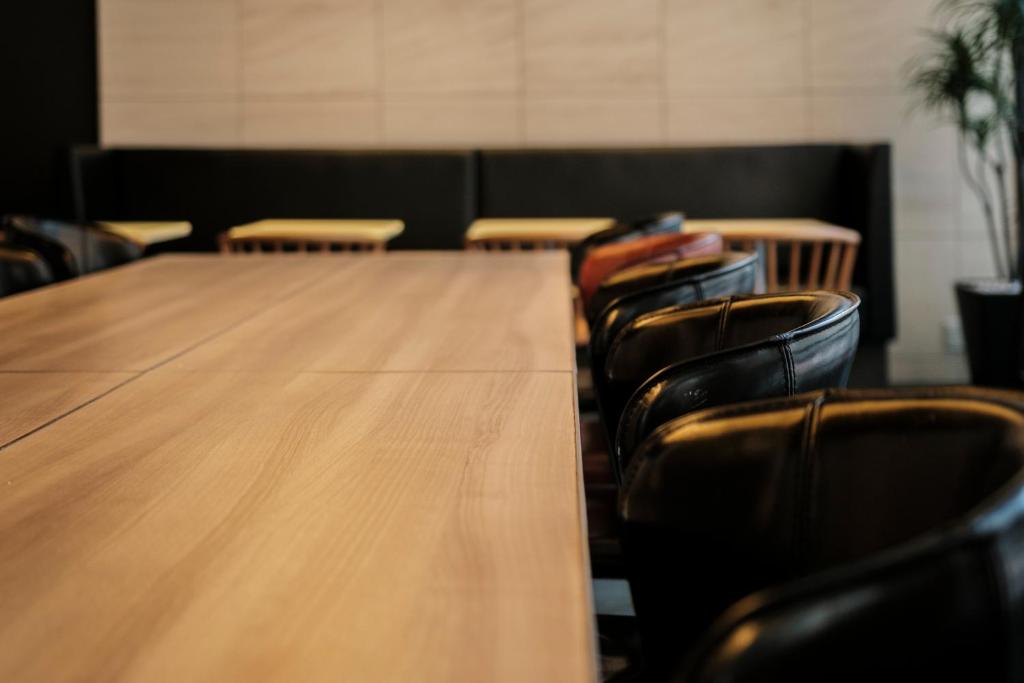 a conference room with a long table and chairs at Tokyu Stay Kamata - Tokyo Haneda in Tokyo
