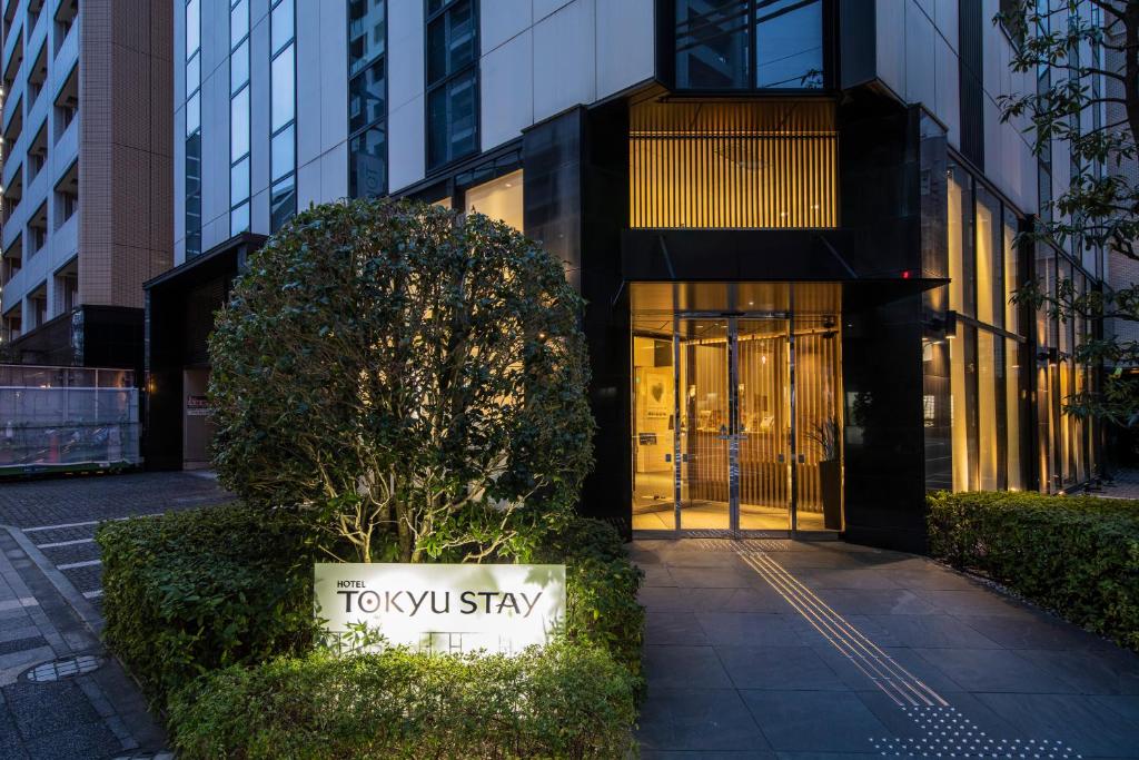 a view of the teddylynstay building at night at Tokyu Stay Kamata - Tokyo Haneda in Tokyo