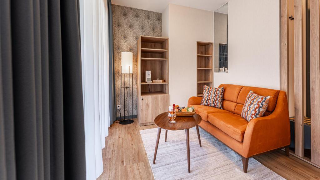 Area soggiorno di KULA Comfort Rooms
