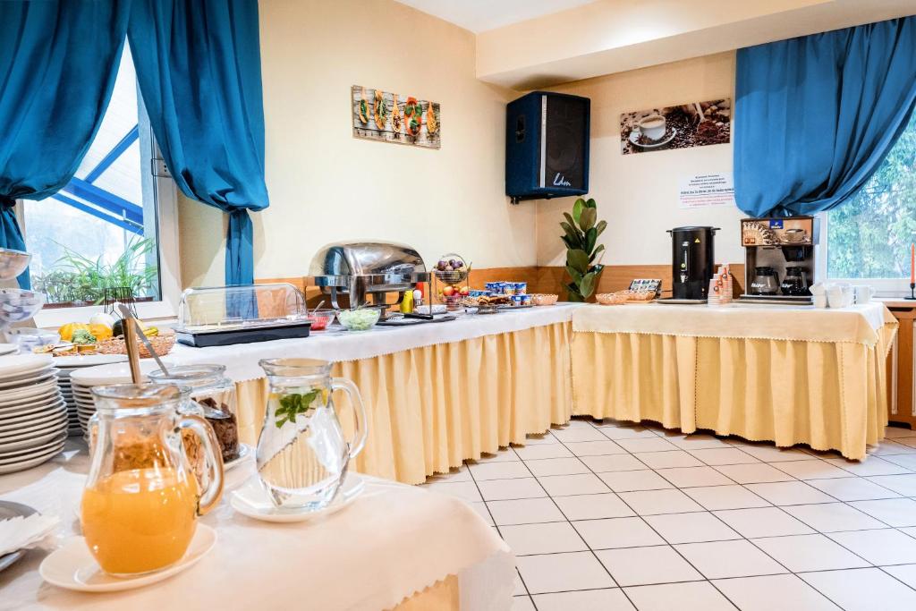Nápoje v ubytovaní Hotel Alf