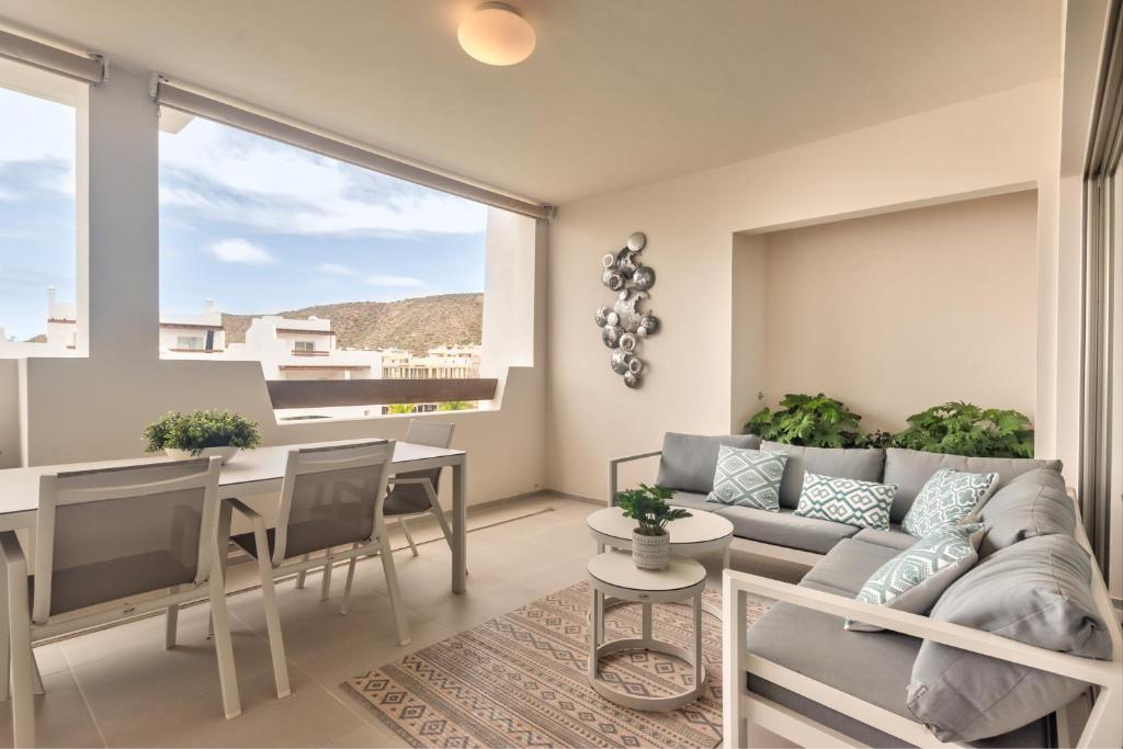 Χώρος καθιστικού στο Jardines - Tisaya 21 POOL VIEW 1B