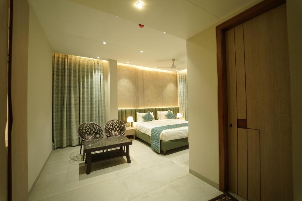 Llit o llits en una habitació de HOTEL LAKSH