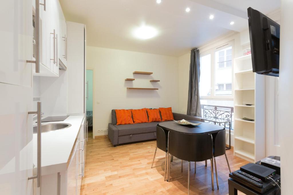 Kuchyň nebo kuchyňský kout v ubytování Appartement Petits Champs