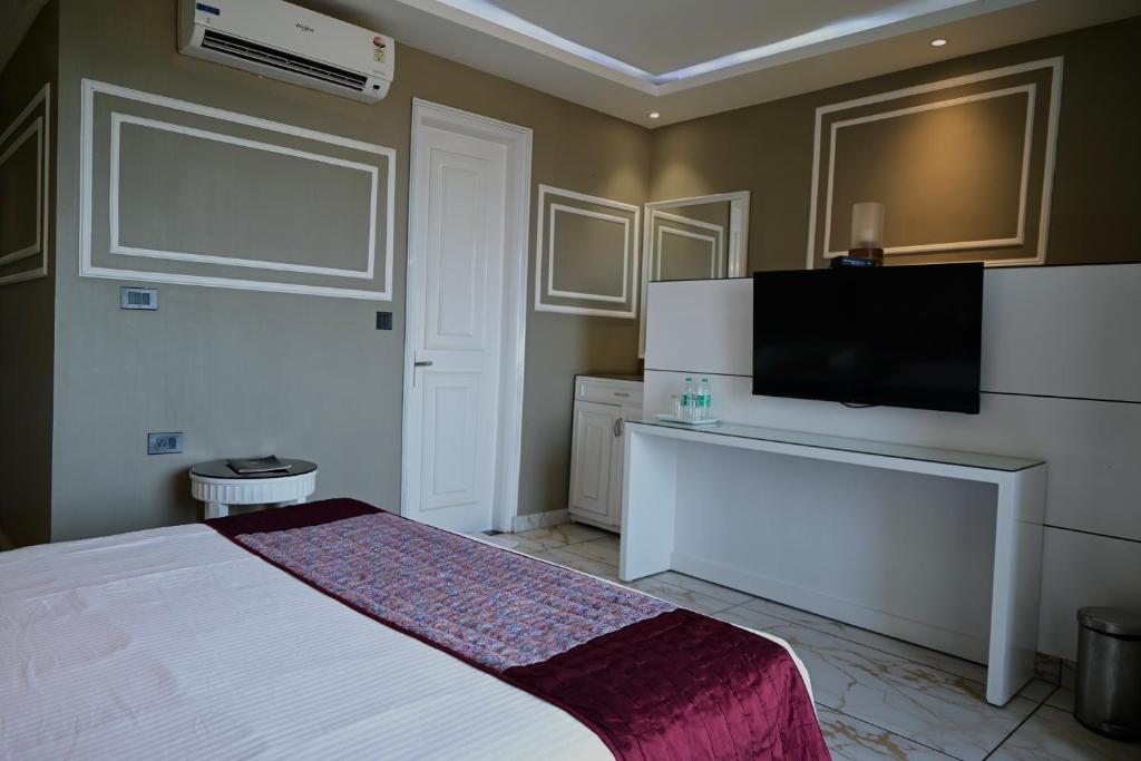 TV a/nebo společenská místnost v ubytování De Alturas Resort