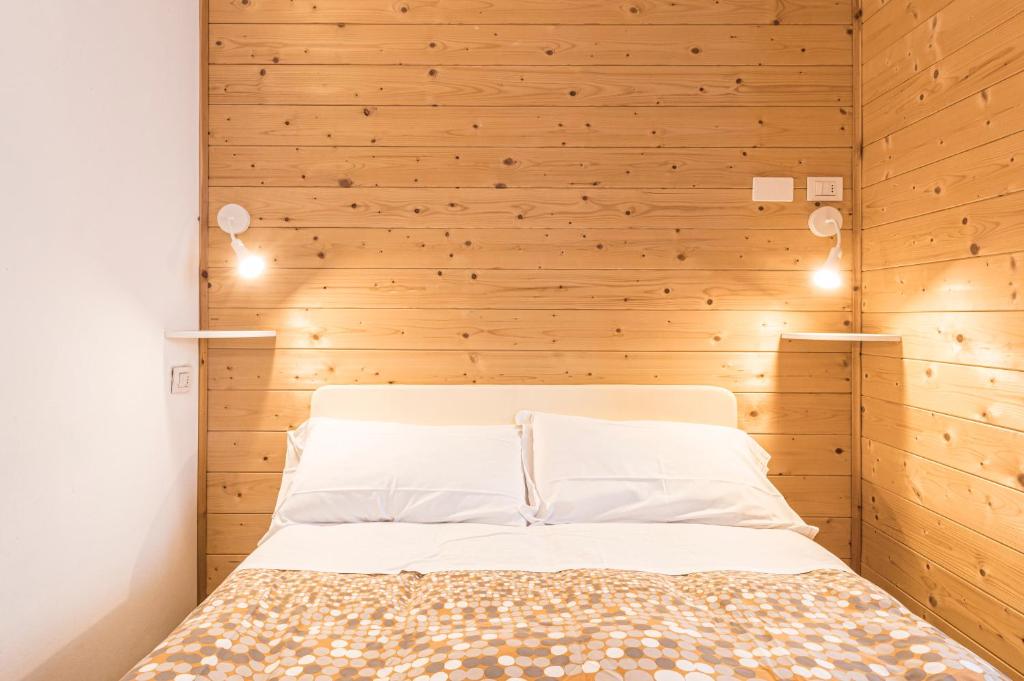 Postel nebo postele na pokoji v ubytování Hotel Vescovi
