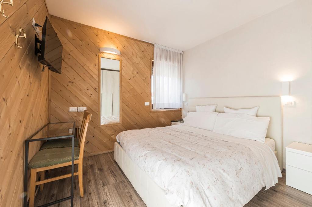 Postel nebo postele na pokoji v ubytování Hotel Vescovi