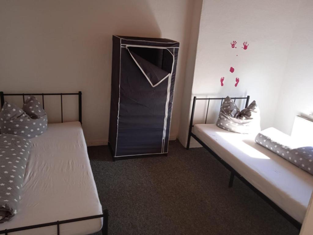 Postel nebo postele na pokoji v ubytování Seeadler-1-6-Personen
